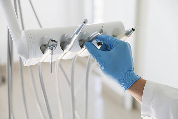 Professional Tooth Extraction technician working in Portola Valley, CA